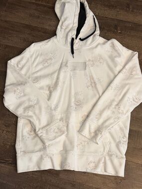 Hollister Cream Hoodie with Subtle Floral Wash